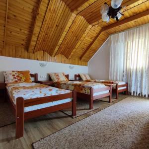Postel nebo postele na pokoji v ubytování SNAM Rooms&Apartment