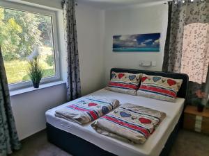 Postel nebo postele na pokoji v ubytování Privatzimmer STEINER