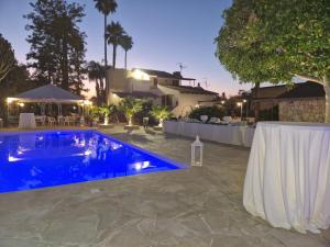 a swimming pool in the backyard of a house at Casa di Lu’ in Floridia