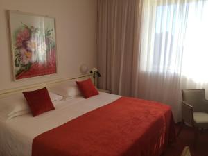 Posteľ alebo postele v izbe v ubytovaní Starhotels Cristallo Palace