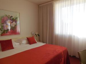 Posteľ alebo postele v izbe v ubytovaní Starhotels Cristallo Palace