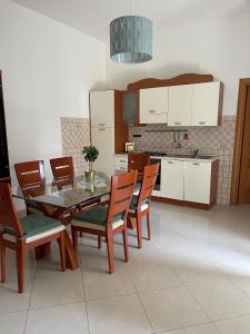 Kuchyň nebo kuchyňský kout v ubytování Arcobaleno Home
