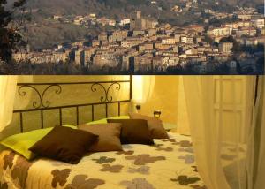 A bed or beds in a room at Thalassa Locanda B&B e appartamento