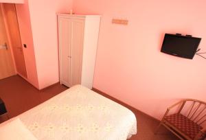 TV a/nebo společenská místnost v ubytování Hotel Torrismondi