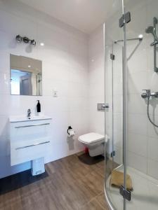 Ванна кімната в Ohotelik Pensjonat w Poniatowej