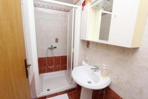 Kúpeľňa v ubytovaní Apartments Dujmović + 32 fotografií