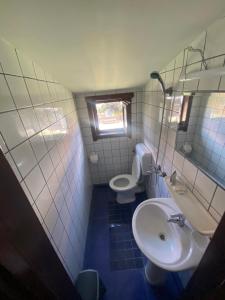 Ванная комната в Casa Pescareasca - Complex Plaja Golf