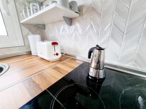 Kuchyň nebo kuchyňský kout v ubytování Apartamento en Mala con vista al mar + 16 fotografií