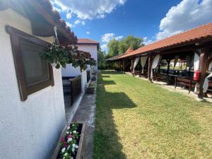 Сад в Casa Pescareasca - Complex Plaja Golf