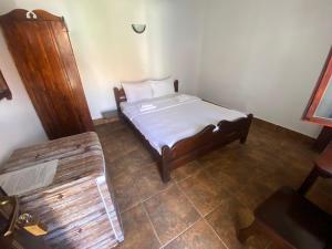 Кровать или кровати в номере Casa Pescareasca - Complex Plaja Golf +18 фотографий