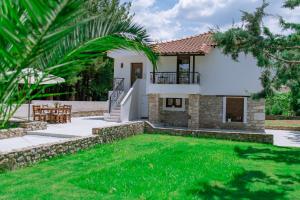 Κήπος έξω από το La Maison d'Été