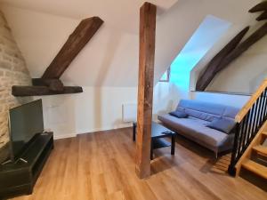 Posteľ alebo postele v izbe v ubytovaní Le Faubourg - Gîte et chambres d'hôte