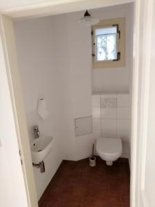 Ванная комната в Ferienwohnung mit Charme in Dresden Pillnitz EG
