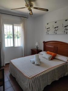 Cama o camas de una habitación en La Buena Siesta