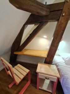 Posteľ alebo postele v izbe v ubytovaní Le Faubourg - Gîte et chambres d'hôte