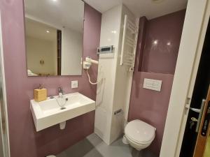 Kúpeľňa v ubytovaní Le Faubourg - Gîte et chambres d'hôte
