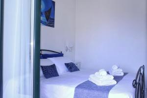 A bed or beds in a room at Villa Ines