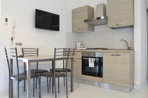 A kitchen or kitchenette at Villa Ines