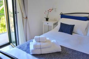 A bed or beds in a room at Villa Ines