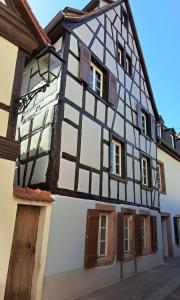 a half timberedbered house with a half timbered at Les Colombages in Colmar