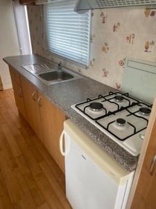 Kuchyň nebo kuchyňský kout v ubytování SUNNY BEACH