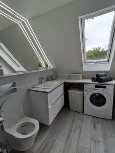Kúpeľňa v ubytovaní Apartament DWA DĘBY