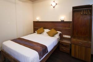 Tropic Tree Maldives客房内的一张或多张床位