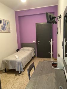 Postel nebo postele na pokoji v ubytování GFH - Hotel Spiaggia D'Oro
