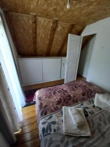 Postel nebo postele na pokoji v ubytování Apartman Stević