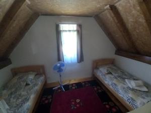 Postel nebo postele na pokoji v ubytování Apartman Stević
