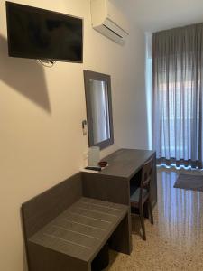 TV a/nebo společenská místnost v ubytování GFH - Hotel Spiaggia D'Oro