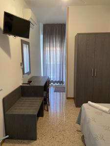 TV a/nebo společenská místnost v ubytování GFH - Hotel Spiaggia D'Oro