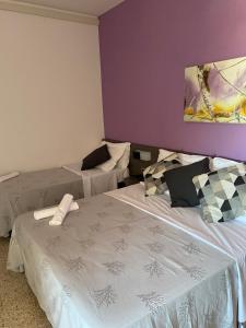 Postel nebo postele na pokoji v ubytování GFH - Hotel Spiaggia D'Oro