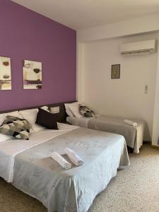 Postel nebo postele na pokoji v ubytování GFH - Hotel Spiaggia D'Oro