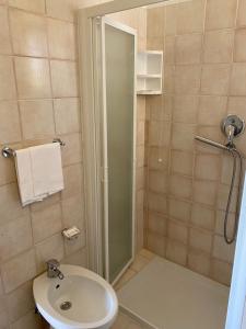 Koupelna v ubytování GFH - Hotel Spiaggia D'Oro