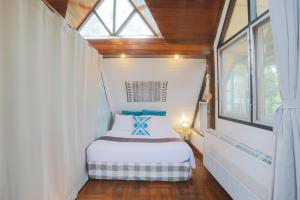 Letto o letti in una camera di Evergreen Pakchong Home