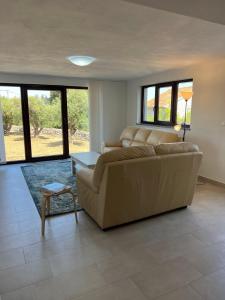 Ruang duduk di Podgora Experience Suite with jacuzzi