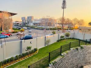 a view of a street with a parking lot at Mikeys Place on Lever with Fibre Uncapped WiFi in Midrand