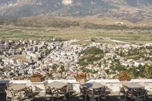 a large group of tents on top of a hill at KERCULLA Resort in Gjirokastër