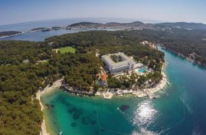 an aerial view of a resort on a island in the water at Podgora Experience Suite II in Nerezine