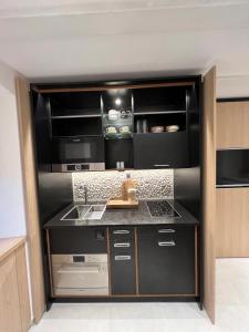 Kuchyň nebo kuchyňský kout v ubytování Podgora Experience Suite II