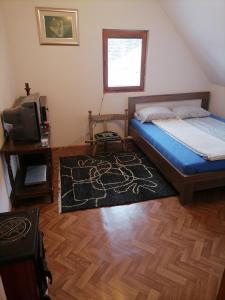 Postel nebo postele na pokoji v ubytování VUK sobe