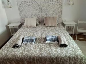 Postel nebo postele na pokoji v ubytování Apartamento Amura en Playa de Las Cucharas