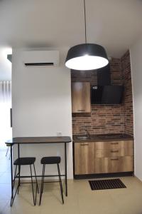 Kuchyň nebo kuchyňský kout v ubytování GoodStay La casa di Giovanni - Apartments - + 62 fotografií