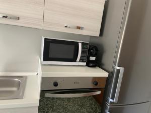 A kitchen or kitchenette at Elena Casa Vacanze 2