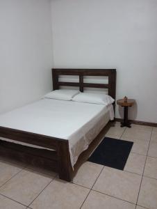 Tempat tidur dalam kamar di LIMON´S HOUSE