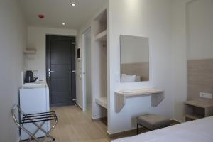 Postel nebo postele na pokoji v ubytování Armonia Rooms
