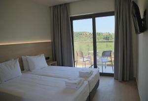 Postel nebo postele na pokoji v ubytování Armonia Rooms