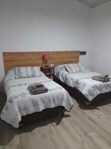Postel nebo postele na pokoji v ubytování CASA CONFORTABLE II + 10 fotografií
