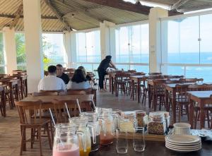En restaurant eller et andet spisested på Pousada Paradise Vista do Atlantico